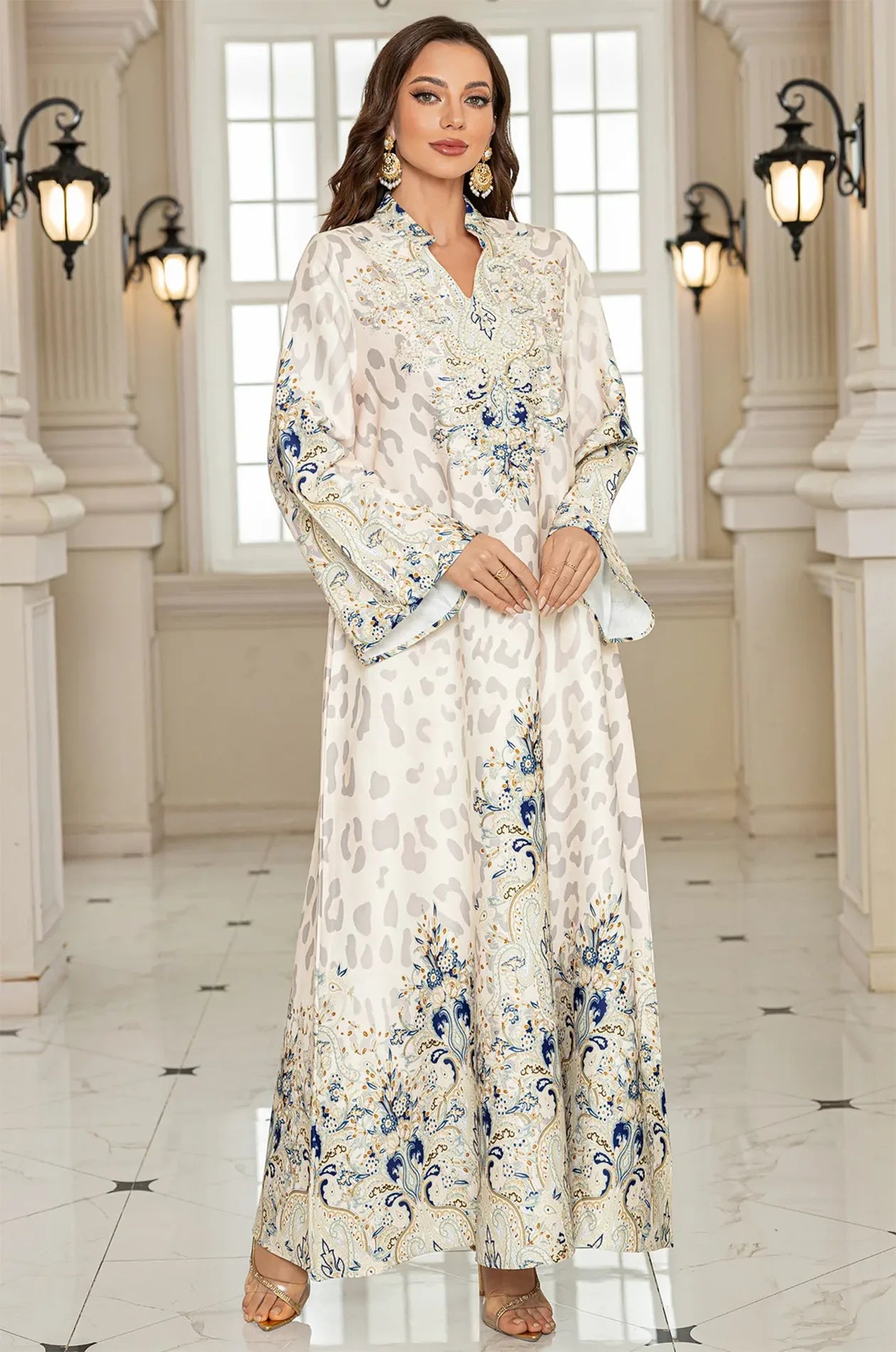 Full front view of the Nyx White Luxury Kaftan emphasizing the wide bell sleeves and ornate hemline detail for a high-end social event.