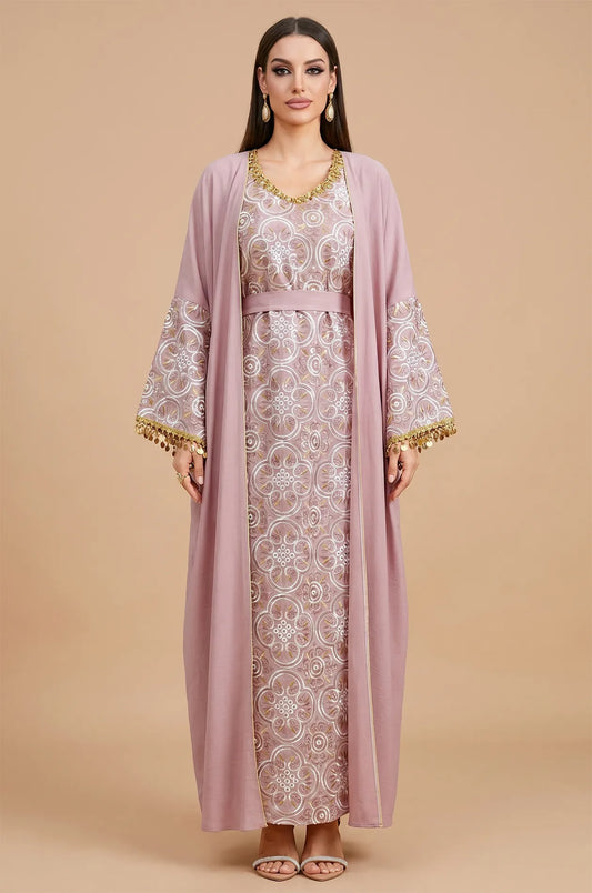 Full front view of the powder pink Novae crepe kaftan from Naylara, showcasing the intricate medallion embroidery and coin details.