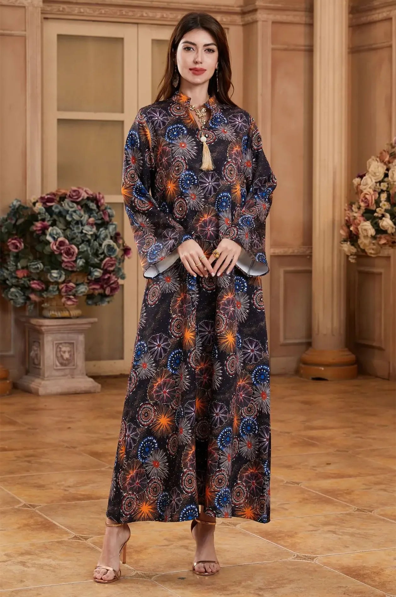 Model posing in the Samia celestial kaftan, showcasing a sophisticated evening look.