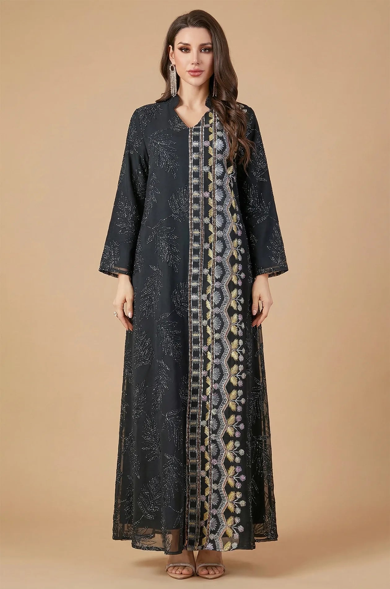 Full-length front view of the Saria black plus size sheer kaftan on a model, highlighting its elegant floor-length silhouette.