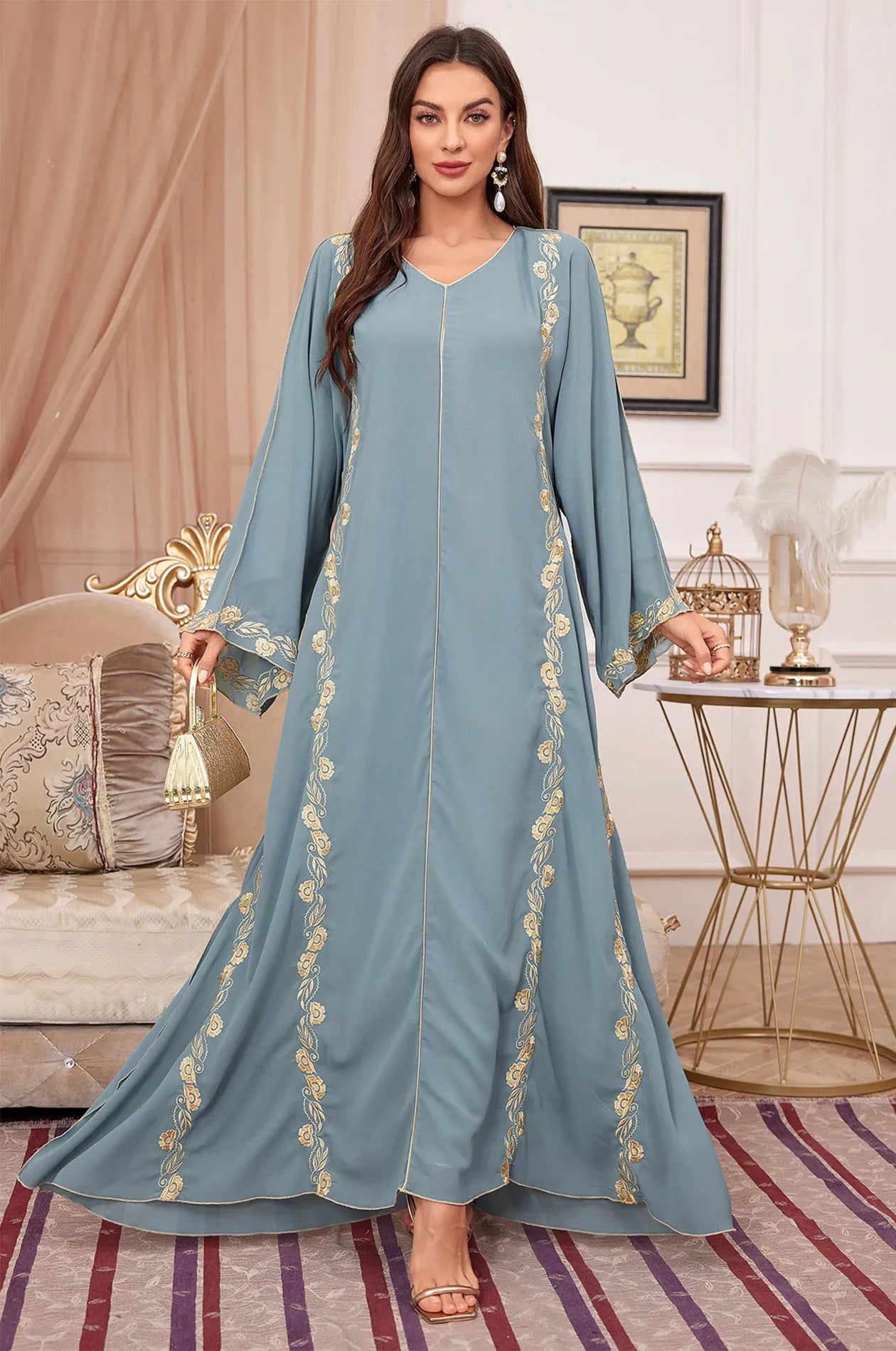 The Tahra kaftan showcased as a perfect wedding guest outfit.