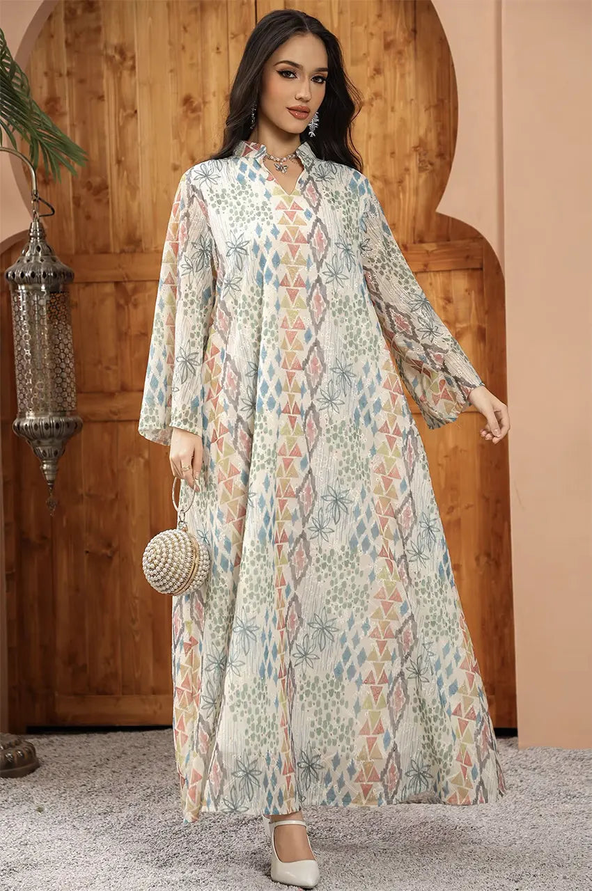 Tyrah white geometric print kaftan designed as luxe resort wear for summer celebrations and high-fashion modesty.