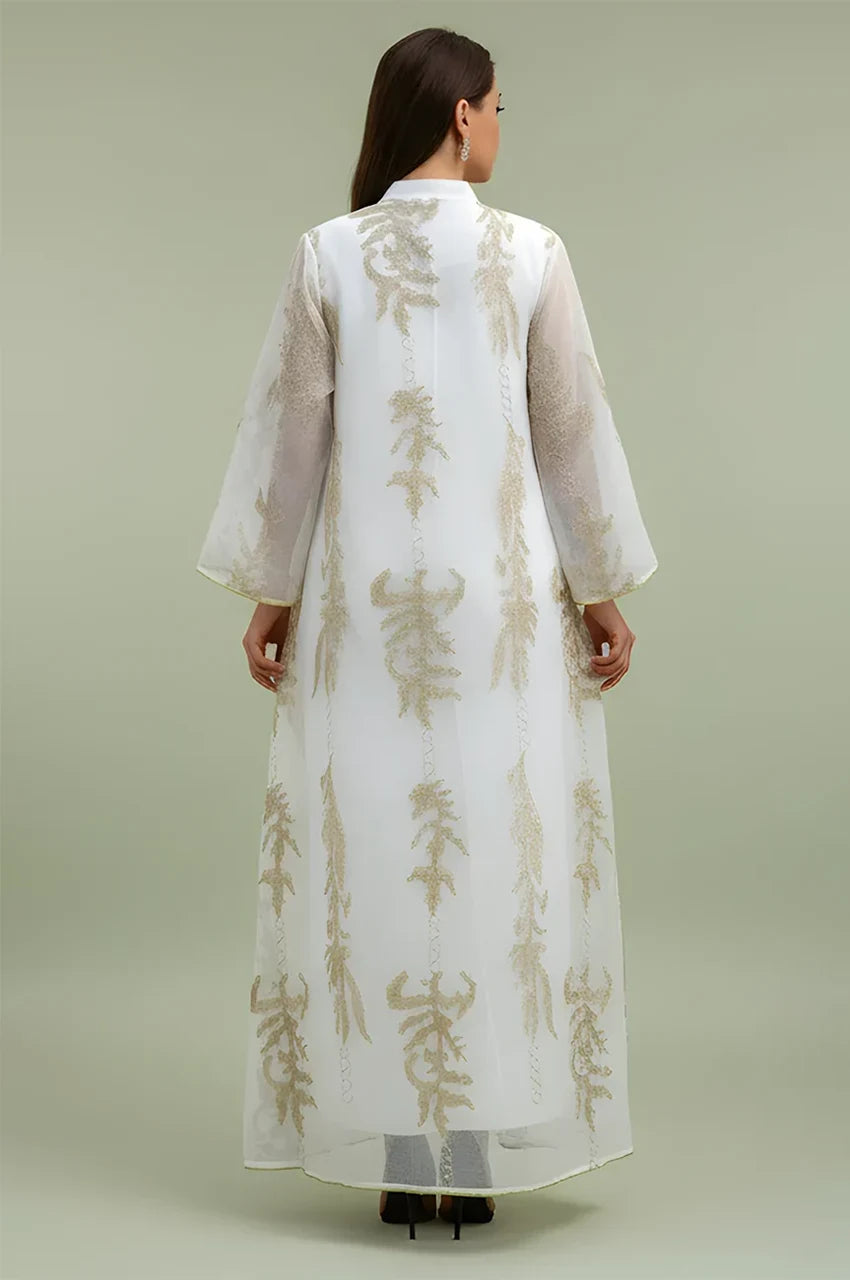 Back view of the Maliya white flower kaftan highlighting the full-length modest silhouette and gold embroidery.