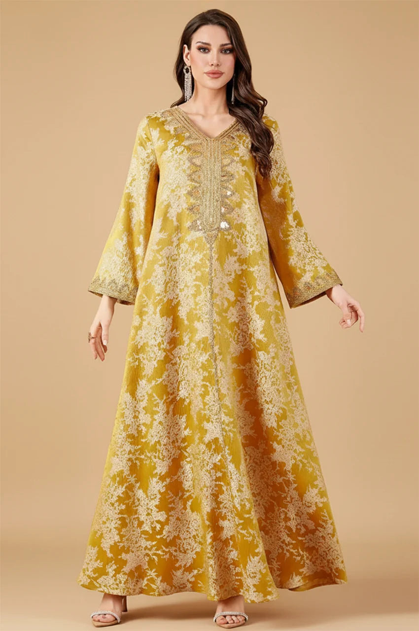 Full body shot of Zafra mustard yellow kaftan with sequin neckline for wedding guests.