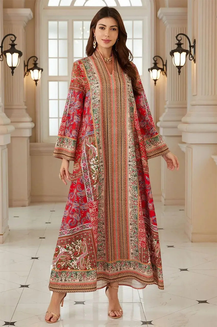 Model wearing the Zarin Red Hand Printed Kaftan in a luxury architectural setting.