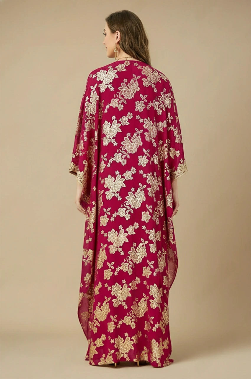 Back profile of the Nehya red Arabic kaftan abaya showing flowing chiffon and floral patterns.