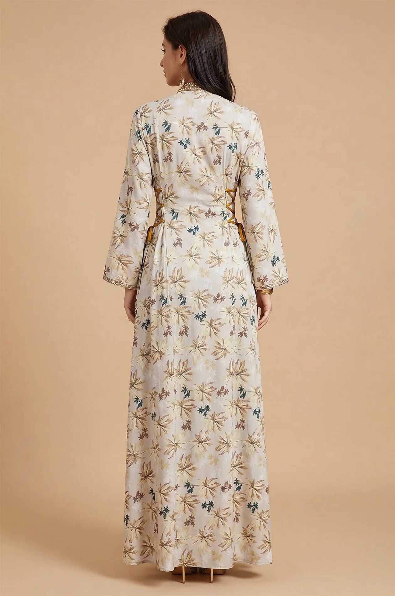 Back view of the Nysria floral print kaftan showing botanical patterns.
