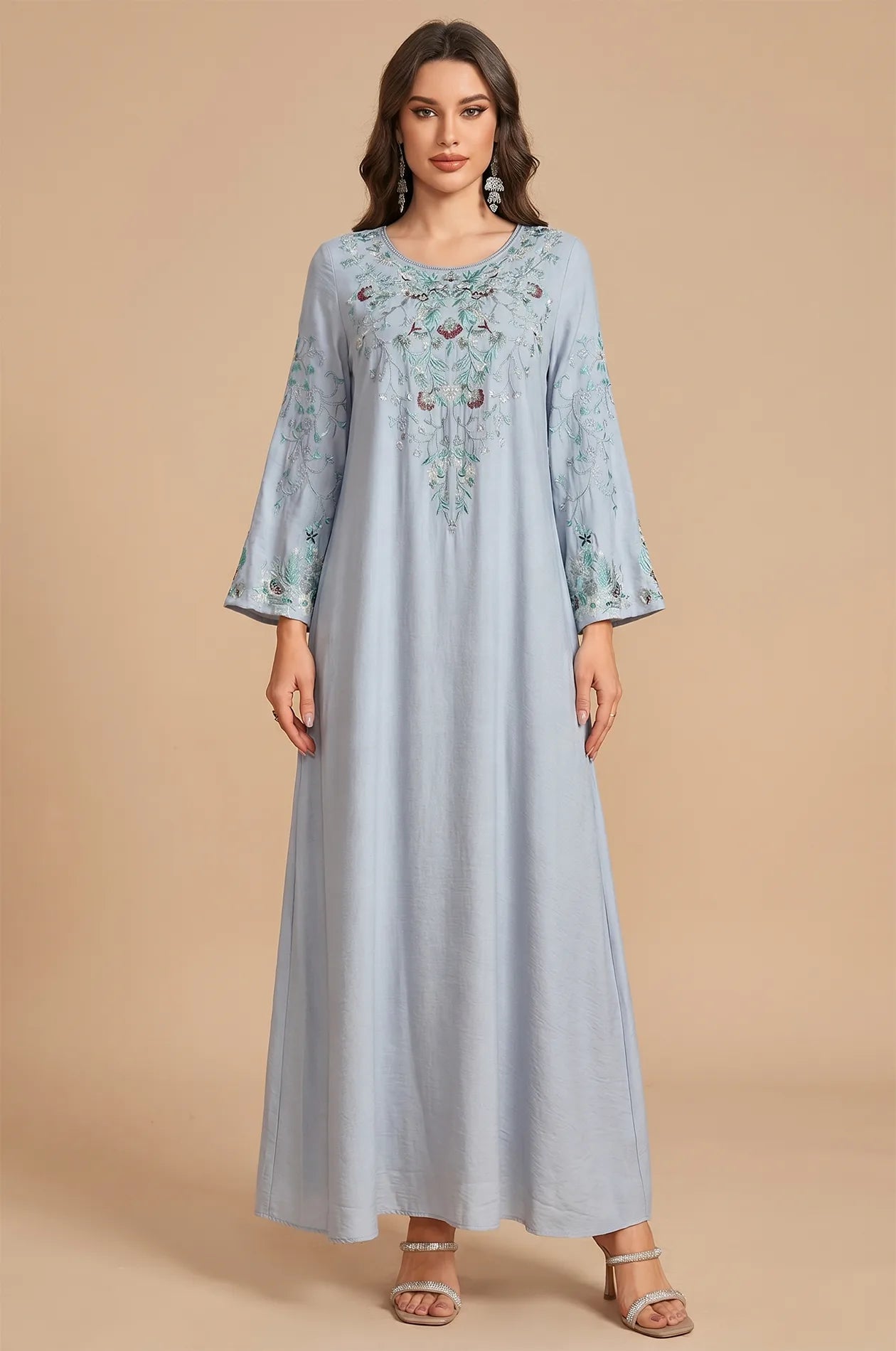 ront view of the Petra dusty blue kaftan with floral embroidery.
