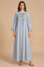 ront view of the Petra dusty blue kaftan with floral embroidery.