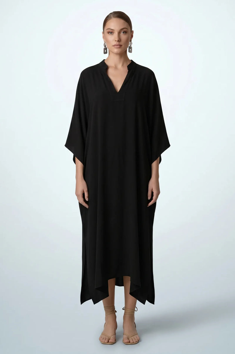 Full length front view of black minimalist plain kaftan with kimono sleeves
