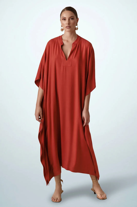 Full length front view of terracotta orange minimalist plain kaftan