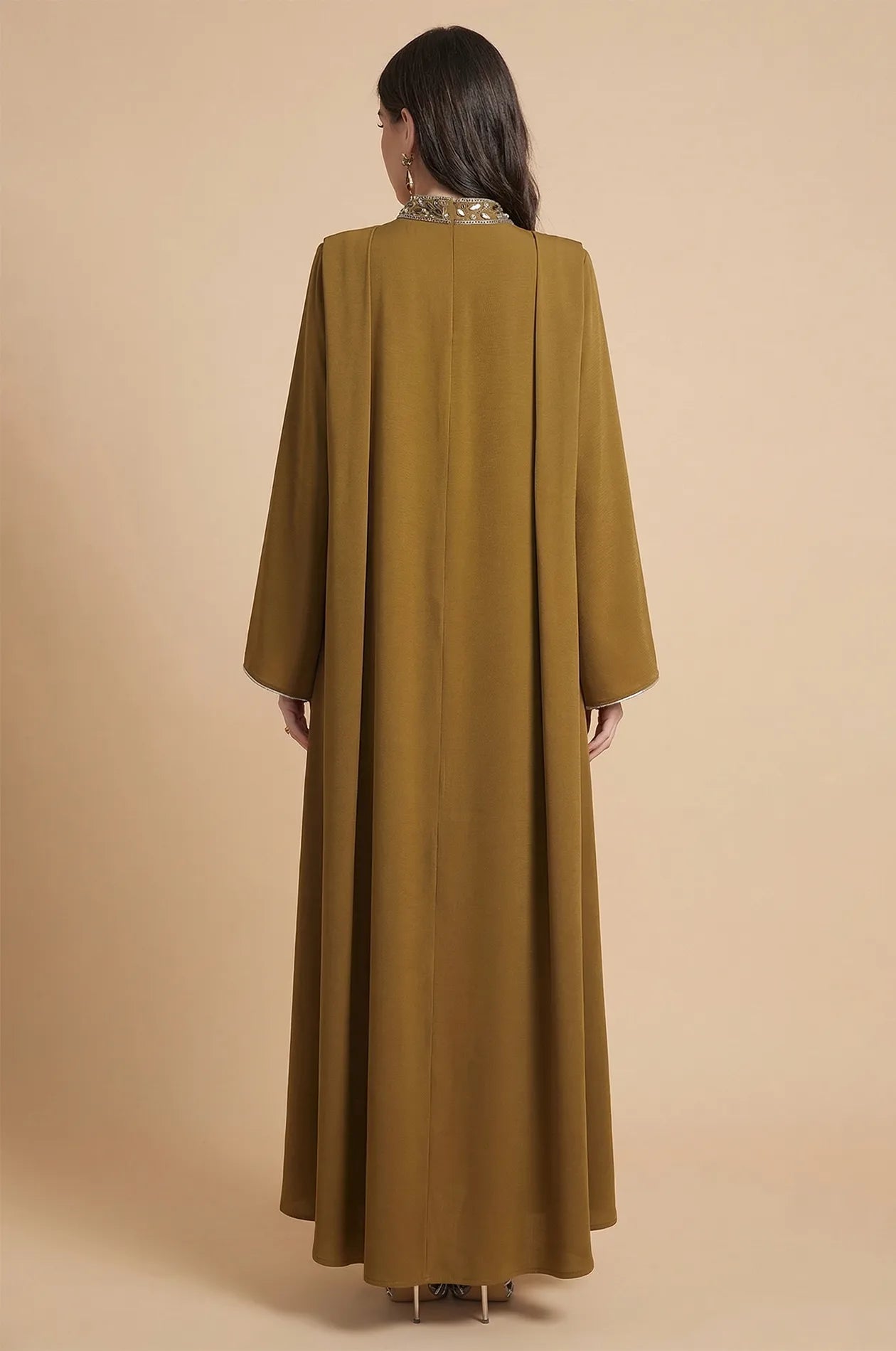 Back view showing the elegant floor-length cape structure of the Rami kaftan.