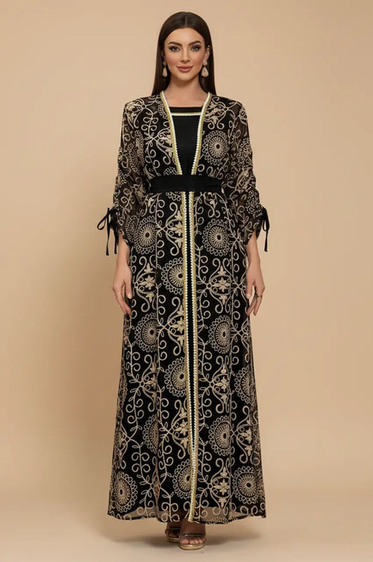 Full front view of the RIYAA black chiffon kaftan featuring antique gold geometric medallion embroidery and bishop sleeves.