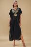 Model wearing SAHIRA Black Embroidered Beach Kaftan with gold detailing, front view