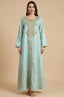 Full front view of the Selas Light Green textured kaftan dress on a neutral studio background.