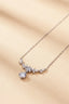 Silver floral vine cubic zirconia necklace on beige background for Kaftan accessories