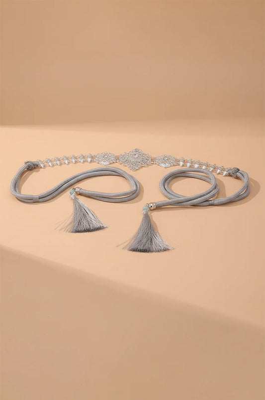 Full view of Naylara's Silver Geometric Rhinestone Spike Link Chain Belt with adjustable rope ties.