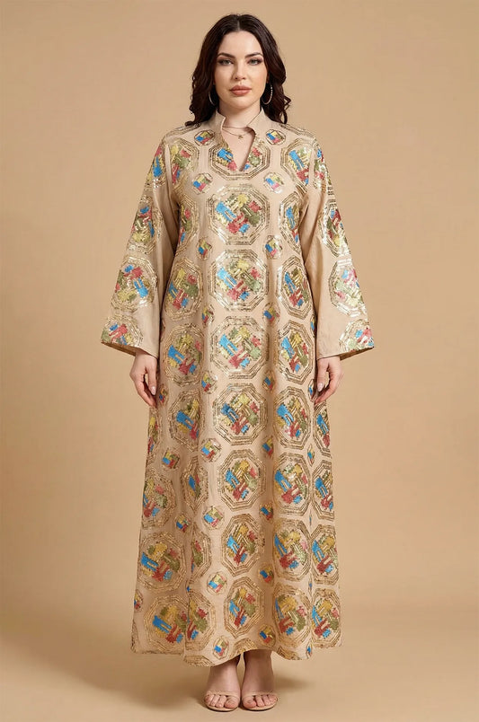 Front studio portrait of the Sorin beige mandarin collar kaftan showcasing the symmetrical geometric embroidery.