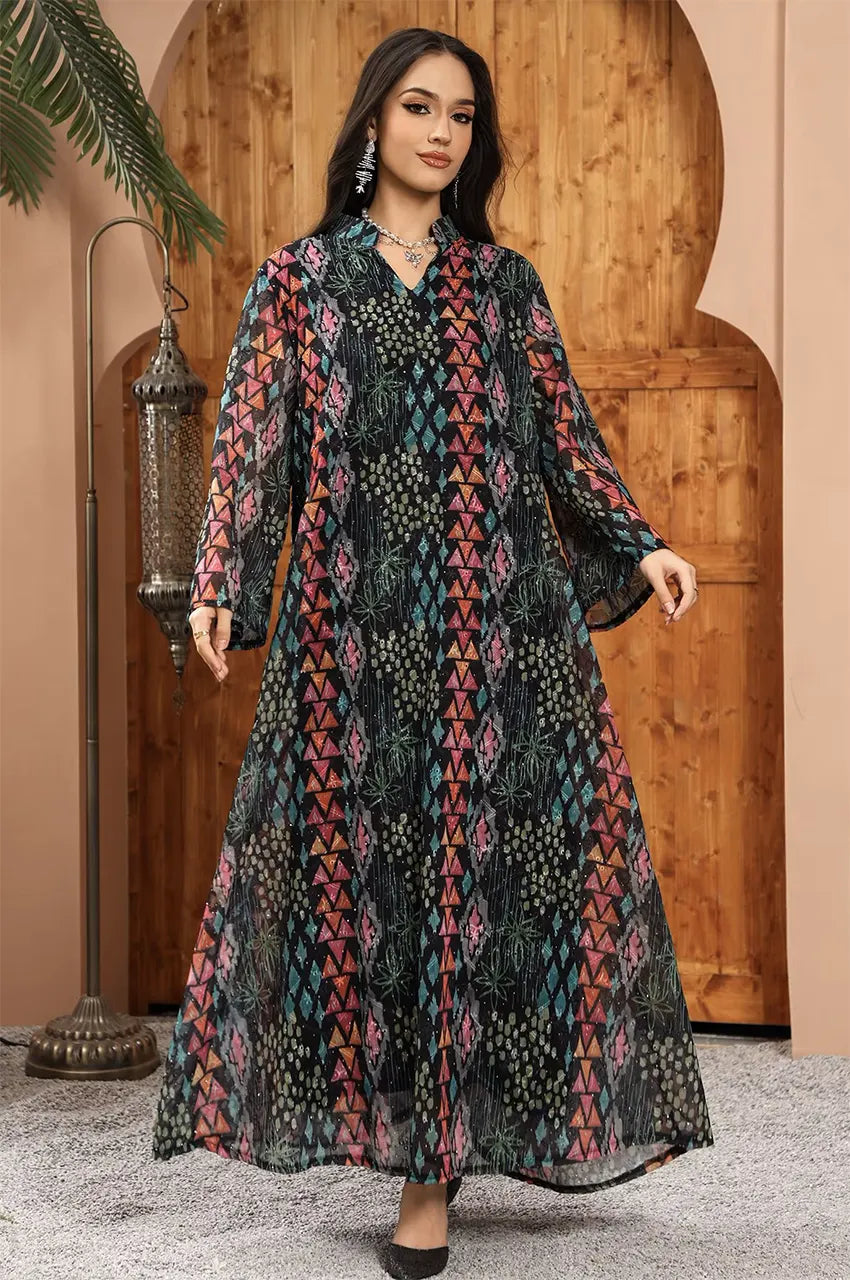 Naylara's Tyrah black geometric print kaftan centered in a luxury modest fashion decor.