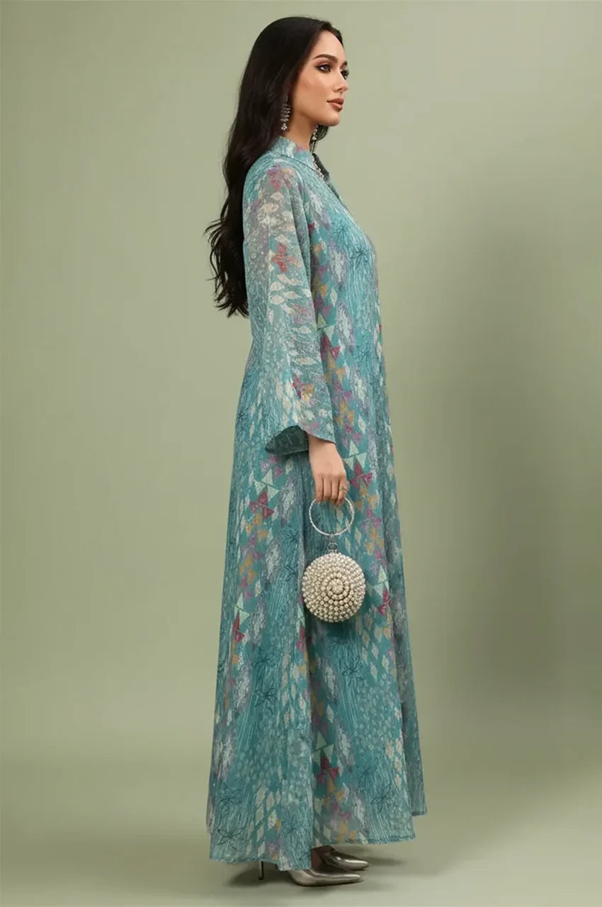 Side profile of the Tyrah light blue geometric print kaftan showcasing the flowing chiffon drape.