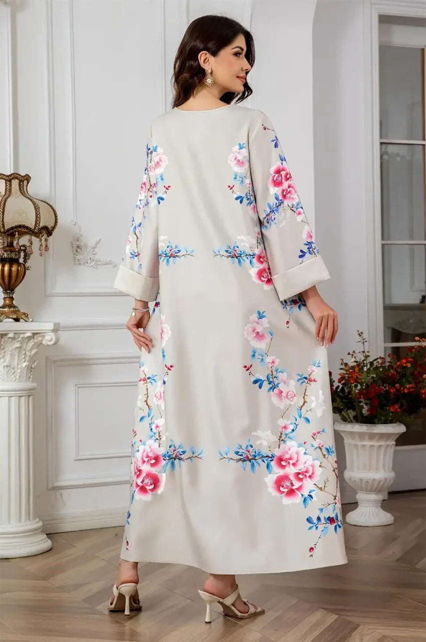 Back-angle view of the Zaree gold sequin kaftan on model.