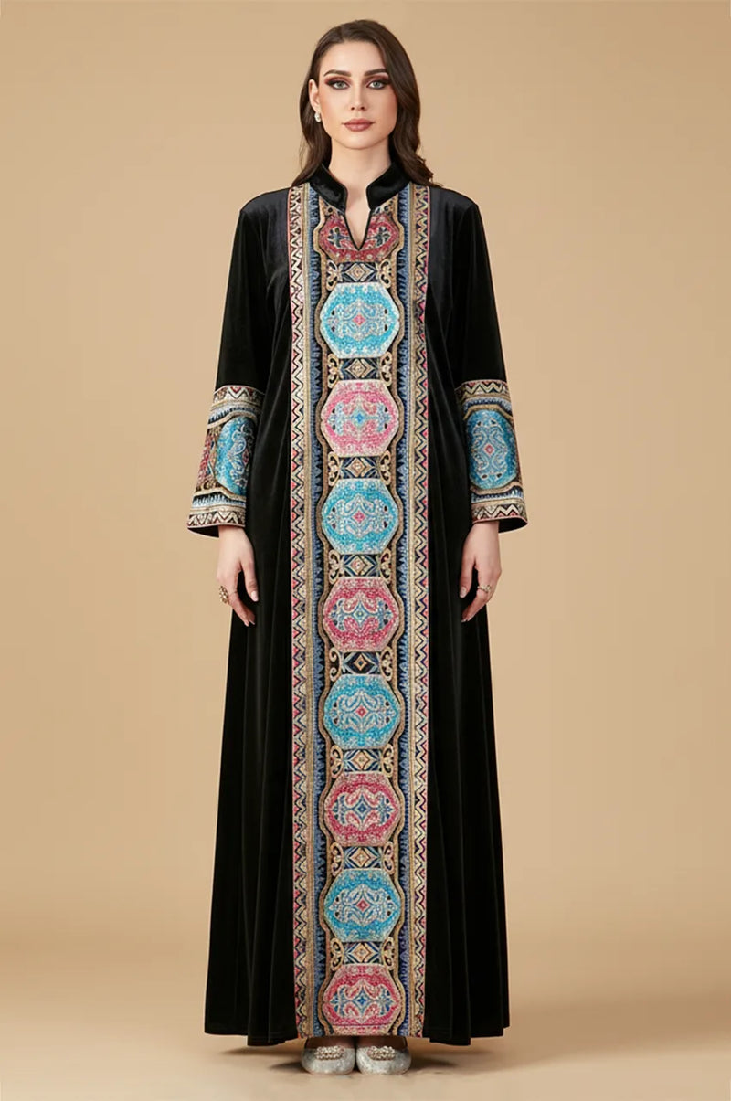 Front view of Zeina black velvet kaftan featuring colorful geometric embroidery.