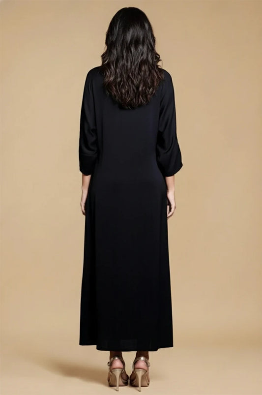 Back view of Adara black satin kaftan dress in smooth satin fabric