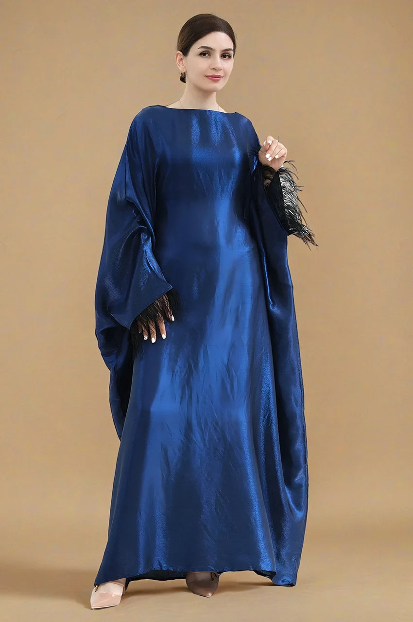 Elegant front pose of ALARA blue satin kaftan gown with glossy finish