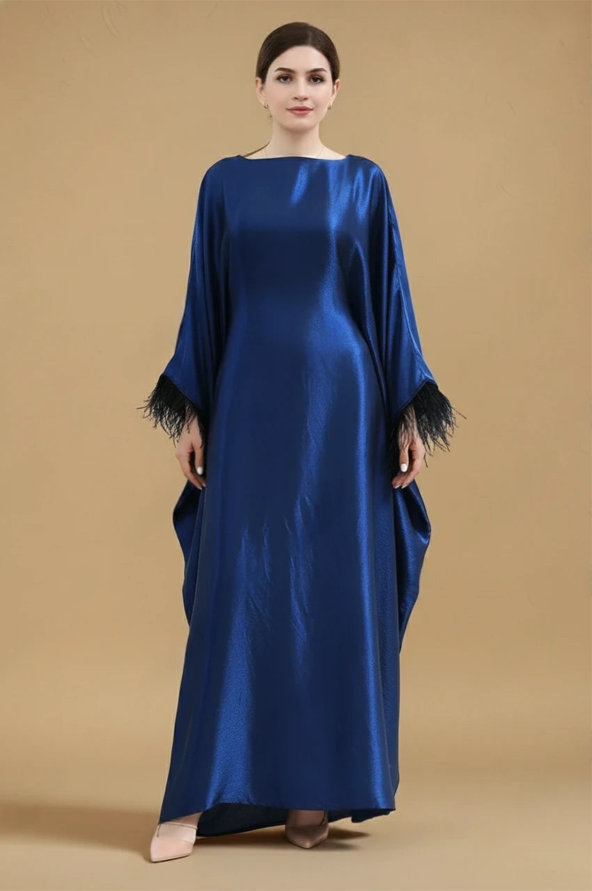 Front view of ALARA blue satin kaftan gown with feather-trimmed sleeves