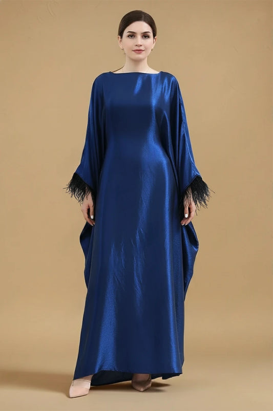 Front view of ALARA blue satin kaftan gown with feather-trimmed sleeves