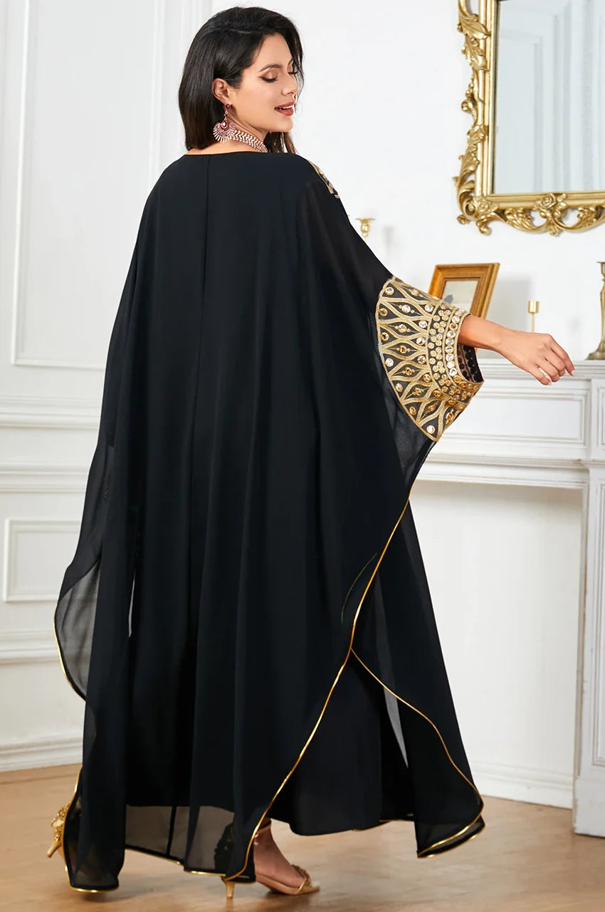 Rear sleeve detail of the Aliya black evening dress.