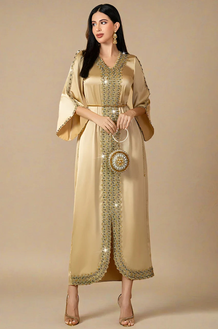 Studio shot of Almira champagne kaftan with shimmering embellished design