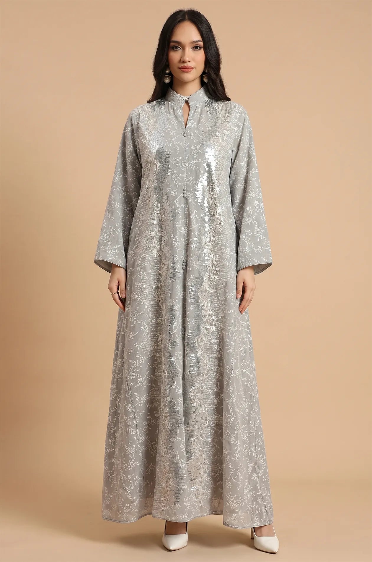 Studio portrait of the Alura Shimmer Kaftan in gray against a neutral background, showing the elegant A-line silhouette.