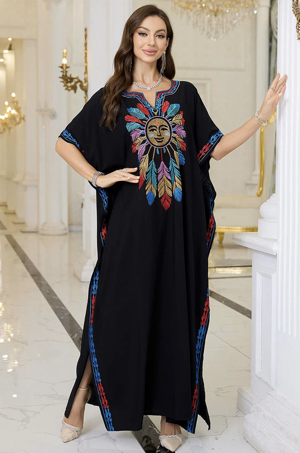 Model wearing Amaya black embroidered cotton kaftan from back side