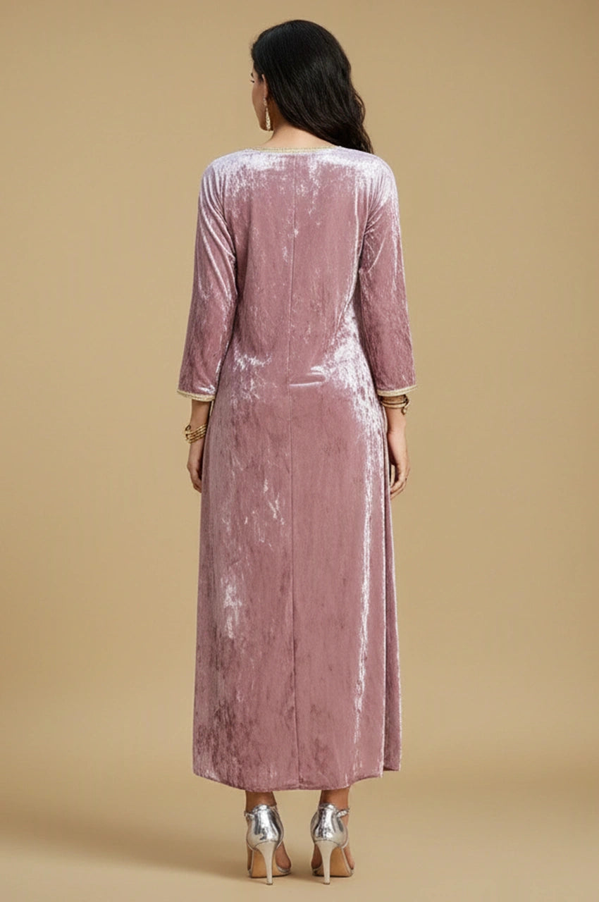 Back view of the Amina pink velvet Pakistani kaftan showing smooth velvet drape