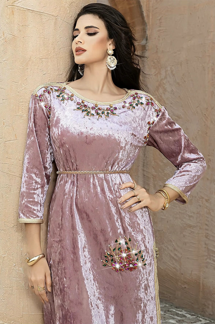 Upper body close-up of pink velvet Pakistani kaftan Amina with neckline embellishments