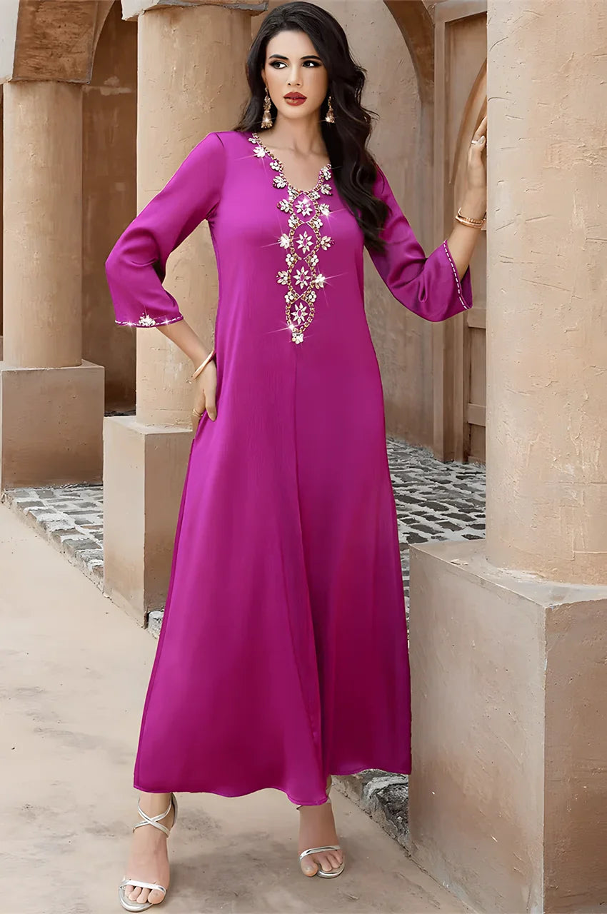 V-neckline of Naylara Amira purple kaftan with crystal floral embellishment