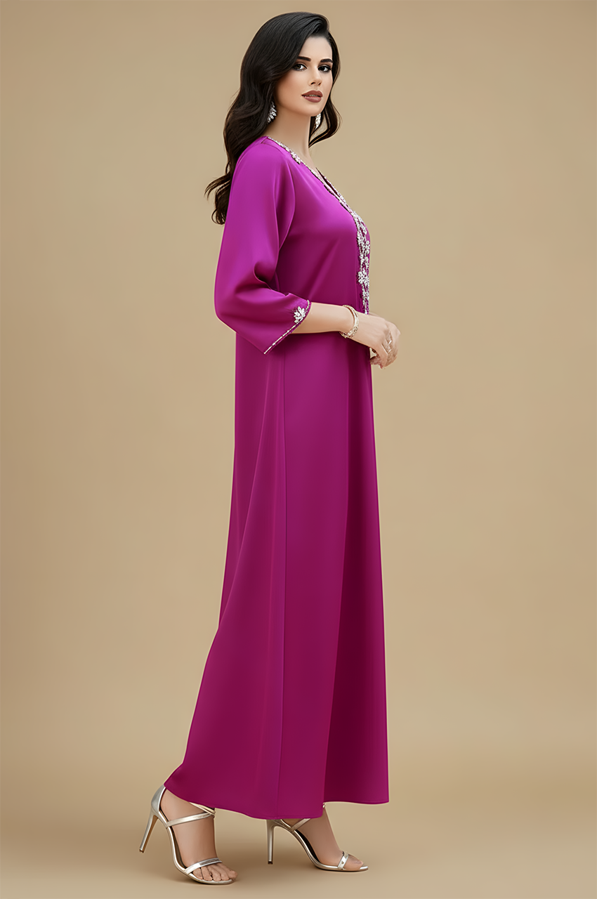 Side view of Naylara Amira purple kaftan showing relaxed drape and sleeves