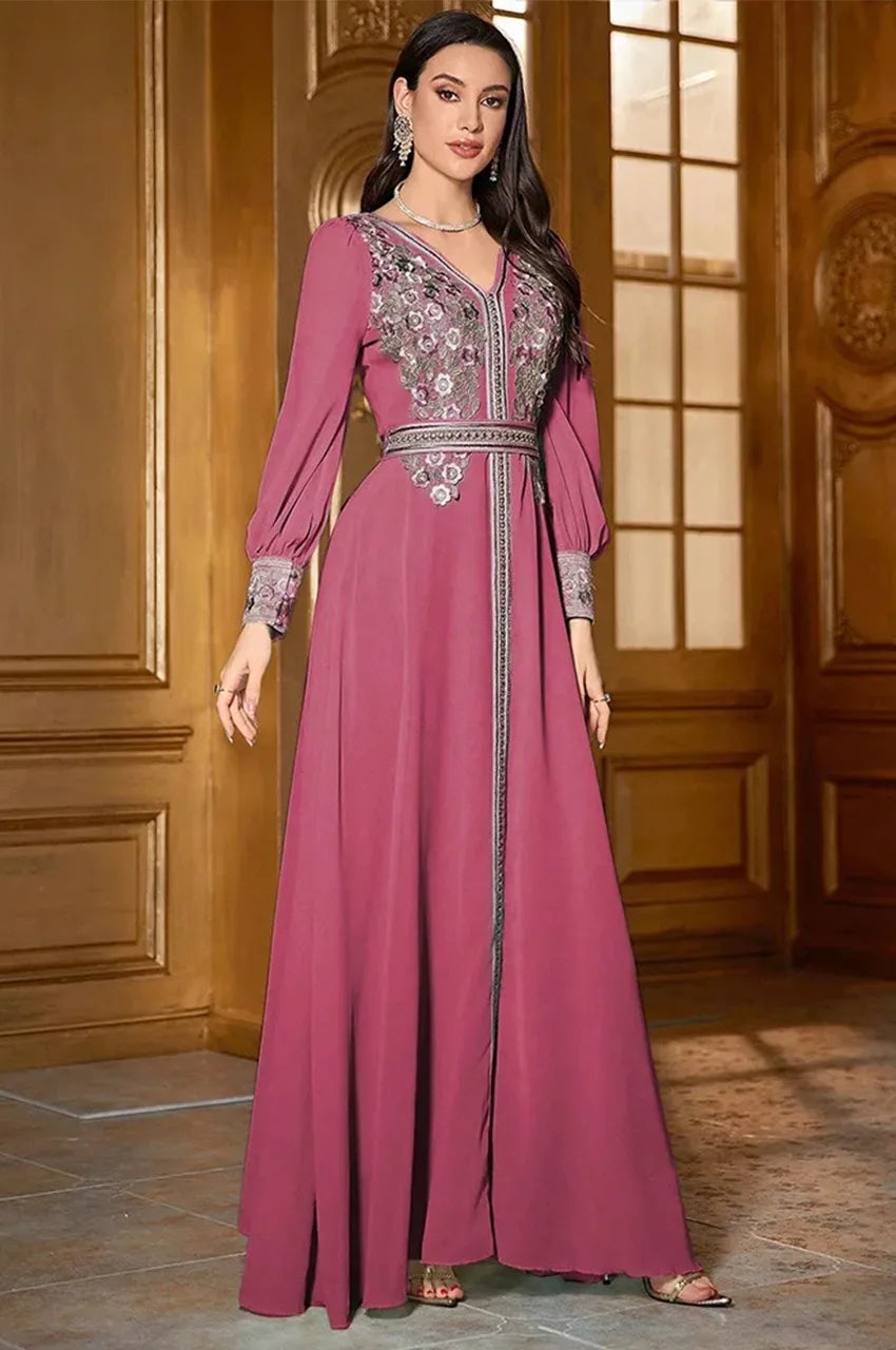 Side view showing details and movement of Arisa hot pink kaftan
