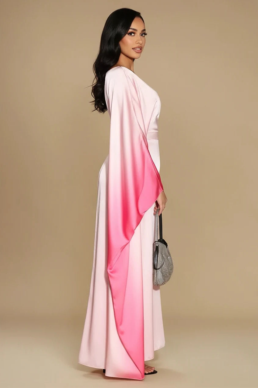 Side profile of model wearing Auressa Pink Butterfly Kaftan showing satin draped design