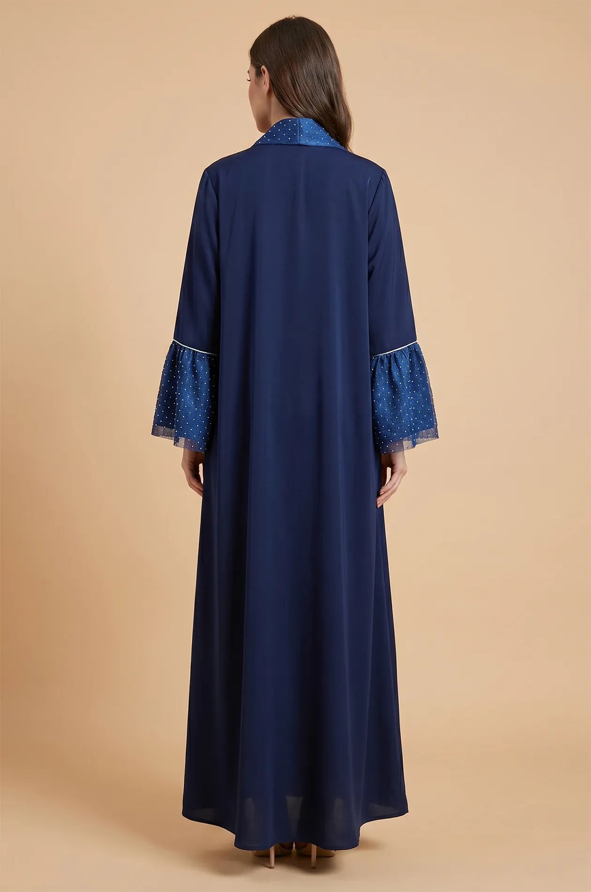 Back view of the Auris Navy Blue solid color Kaftan showing the floor-length modest drape and shimmering collar.