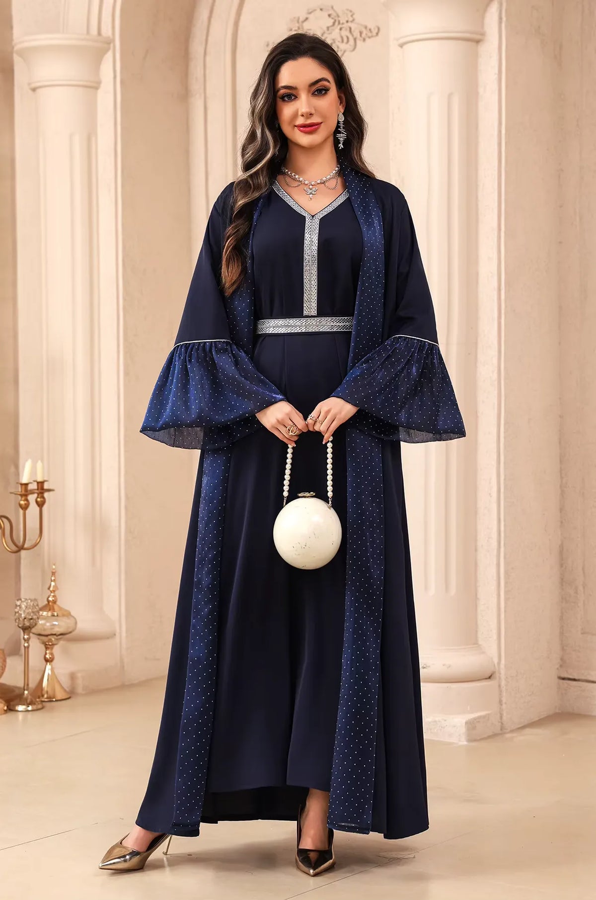 Frontal view of the Auris Blue Kaftan by Naylara, perfect for weddings or formal parties with its elegant modest silhouette.