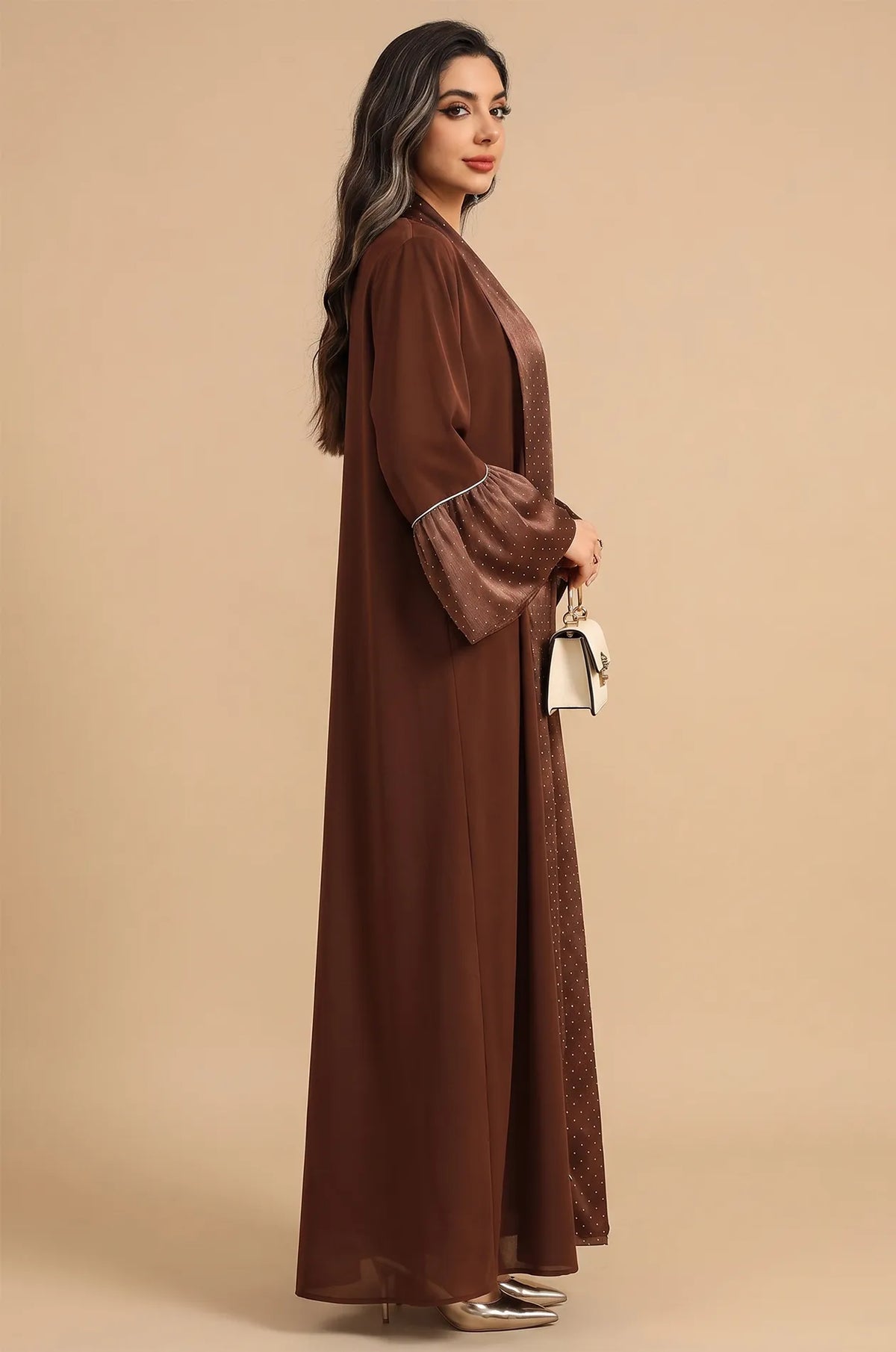 Side profile of the Auris Brown Kaftan highlighting the dramatic tiered ruffle sleeves and modest A-line silhouette.