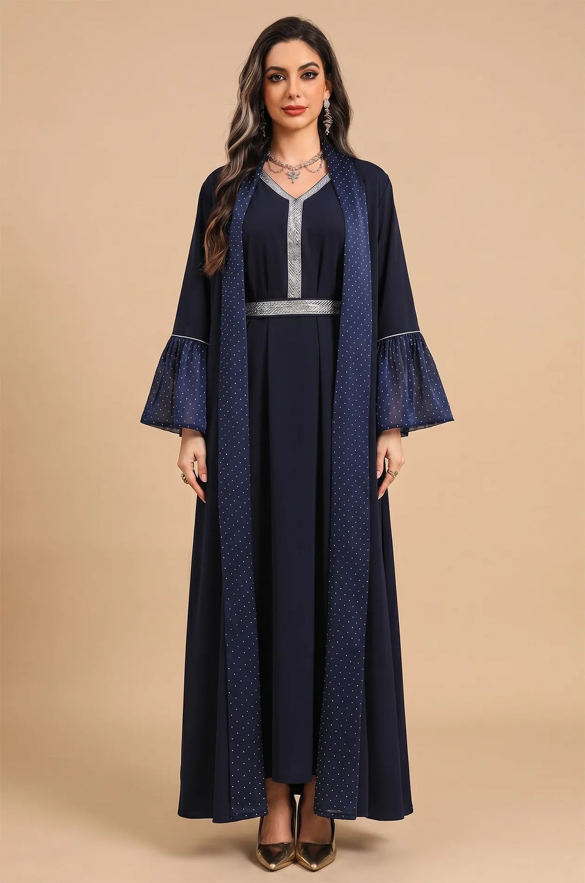 Professional studio portrait of the Auris Blue solid color Kaftan showcasing the full-length modest design and silver trim.