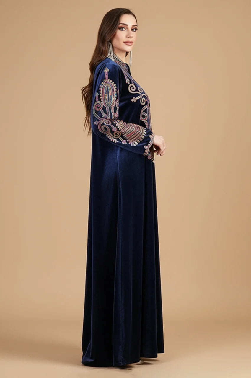 Side profile of Navy Blue velvet kaftan displaying sleeve embroidery work.