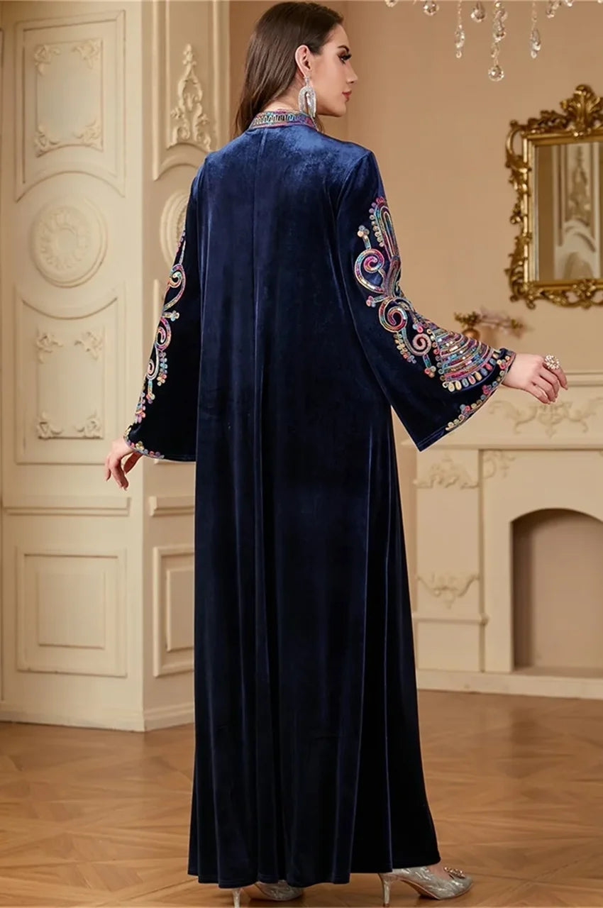 Detail shot of the back sleeve embroidery on the Navy Blue velvet kaftan.