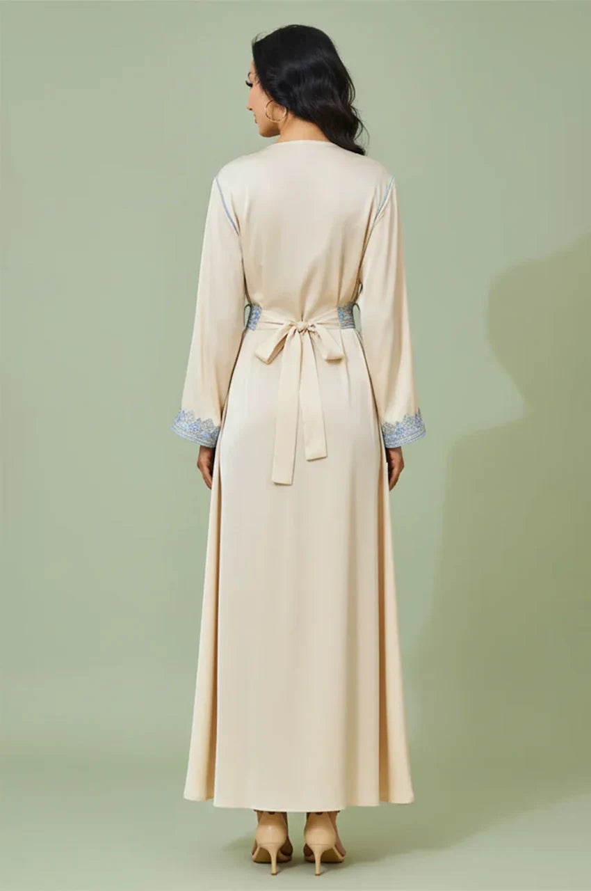 Rear view of Ayana cream satin kaftan showing the tied Mdamma belt.