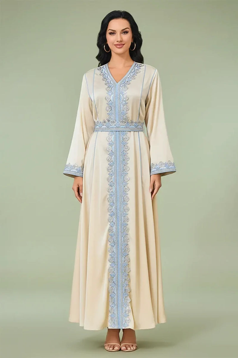 Front view of Ayana long satin kaftan in cream with blue embroidery.