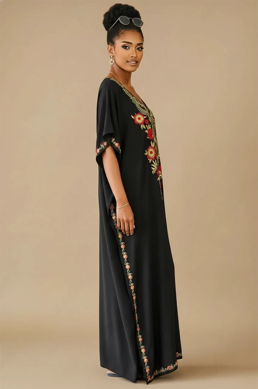 Aylen black bohemian embroidered kaftan side view with floral gold and red embroidery