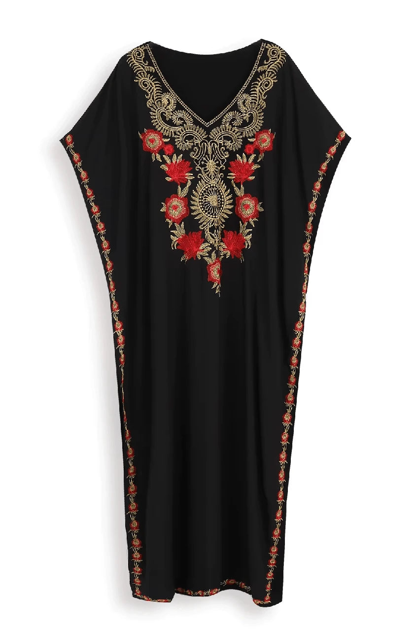 Close-up of embroidery patterns on Aylen black bohemian kaftan neckline